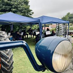 Brass band and tractor  by Karima Hammadi