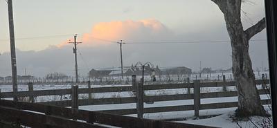 Golden cloud over snow  by Peter Tumelty 